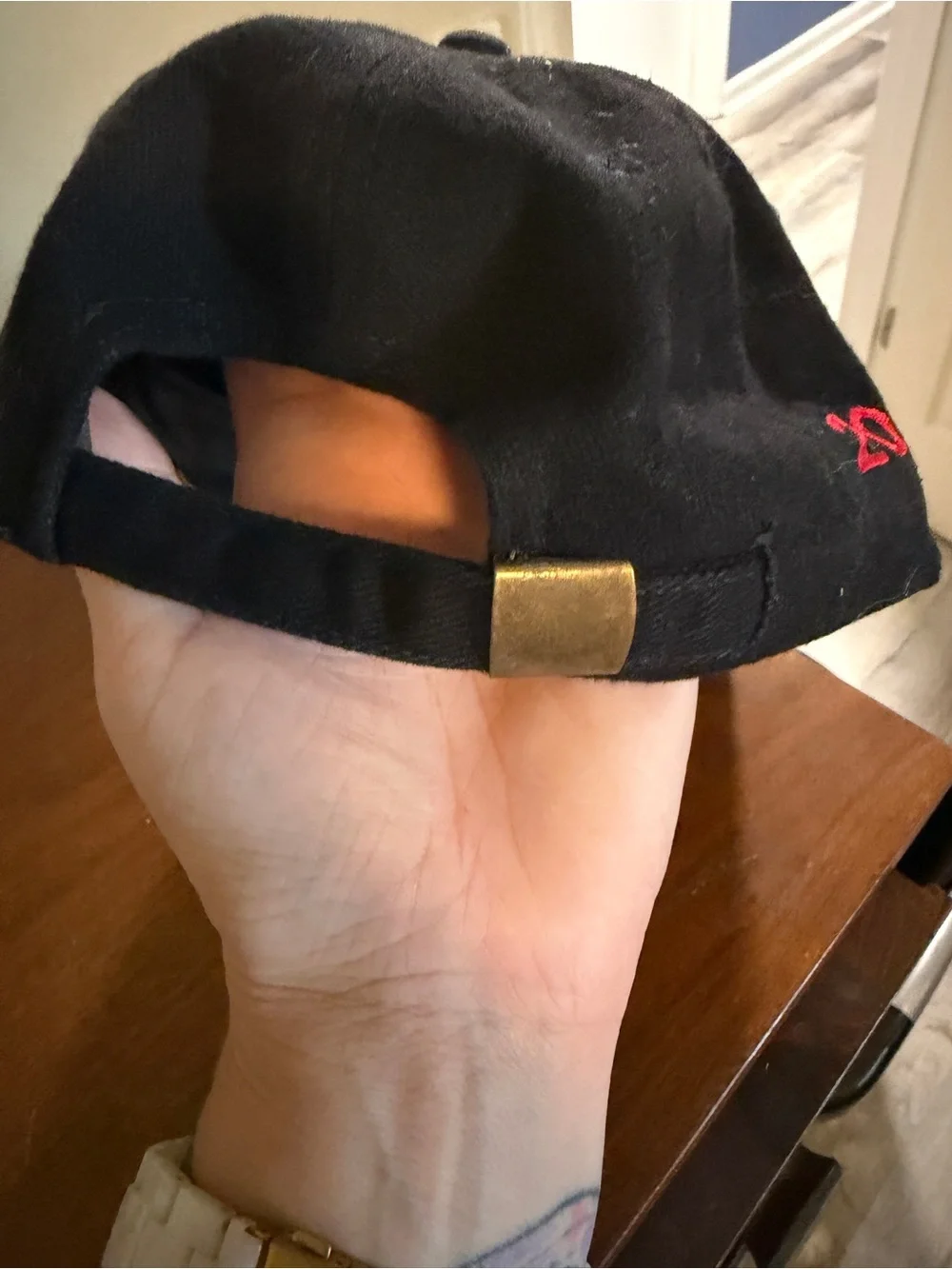 Truck Tour Black Baseball Cap with Red Logo